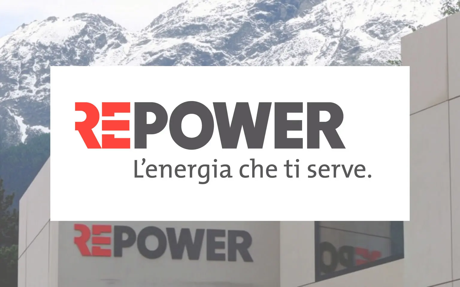 Logo di Repower con lo slogan "L'energia che ti serve" su uno sfondo montano.